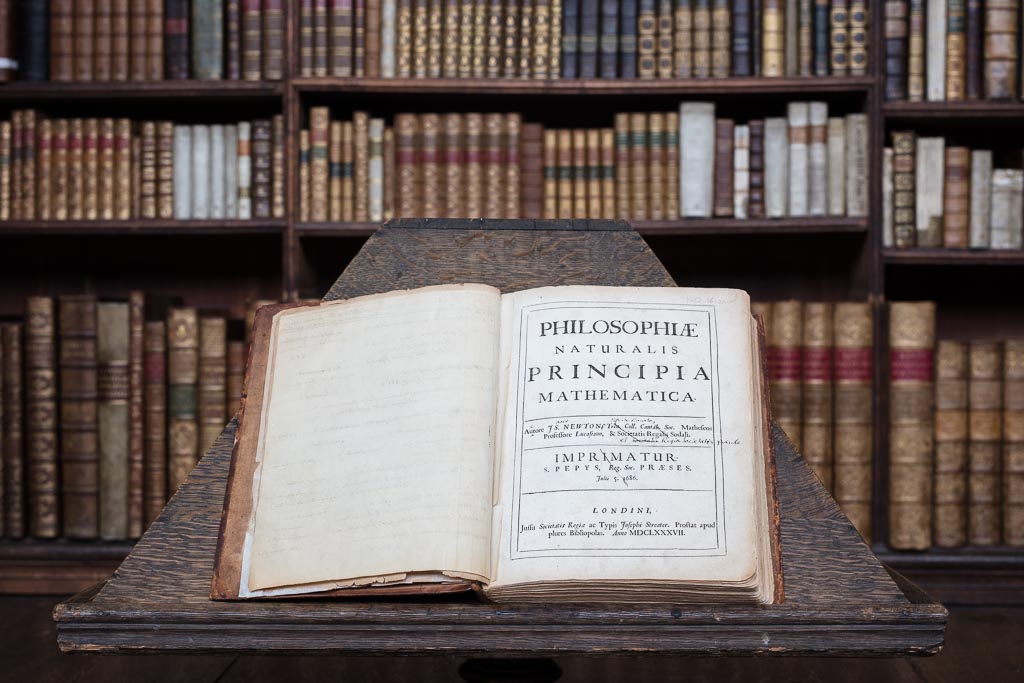 Isaac Newton's personal copy of the Principia in the Wren Library. Newton used this copy to make corrections for the second edition. It is from this book that the images were created to design the Newton Scarf.