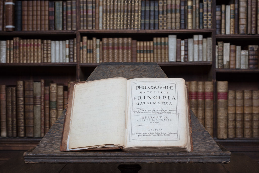 The Philosophiæ Naturalis Principia Mathematica (The Principia for short) by Isaac Newton in the Wren Library, Trinity College, Cambridge
